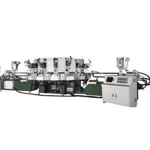 Machine de moulage par injection automatique bicolore 16/20 stations pour la fabrication de semelles de chaussures de travail, de sécurité, en cuir et de chaussures de montagne - Product Image 1