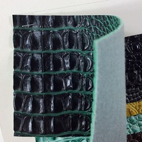 Cuir d'imitation crocodile vert avec une sensation de cuir véritable