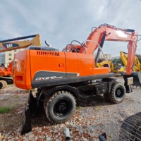 Excavatrice sur roues hydraulique Doosan DX210W-9C d'occasion 20 tonnes, modèle original 2023, à bas prix, avec garantie d'un an, à vendre
