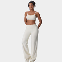 Vêtements de sport pour femmes, ensemble de haute qualité pour le fitness et le yoga, comprenant un soutien-gorge de sport court à bretelles spaghetti avec logo frontal uni et un legging large