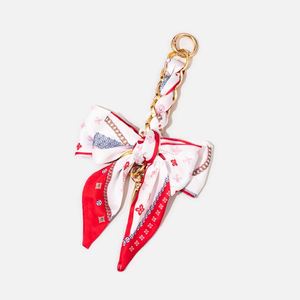 Al por mayor: Cadena de metal para bolso de hombro con lazo de pañuelo de seda y llavero de pañuelo - Product Image 3