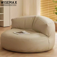 MEUBLES WISEMAX Vente en gros de fauteuils canapés géants pour le salon, grands poufs en cuir pour adultes