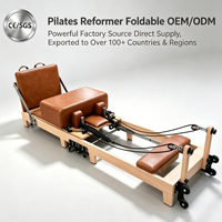Reformer de Pilates pliable haut de gamme avec structure en bois de chêne, machine de Pilates professionnelle pour les distributeurs et les studios haut de gamme