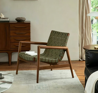 Fauteuil moderne en bois massif avec accents en cuir tressé pour salon, hôtel et villa