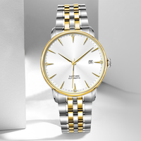 Montre à quartz minimaliste de luxe unisexe avec bracelet en acier inoxydable bicolore, cadran en verre, affichage de la date et fermoir papillon