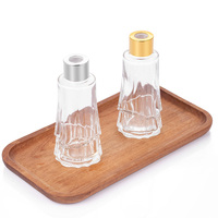 Flacon roll-on en verre transparent de 100 ml de qualité supérieure pour diffuseurs d'huiles essentielles avec emballage en stick et prix direct usine