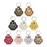 Nouveau porte-clés souvenir pour animaux de compagnie en cuir, style Méditerranéen, avec pendentif patte de chat et de chien, pour toutes les saisons, étui pour clés de voiture