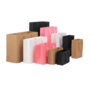 Vente chaude Sacs de shopping cadeaux de luxe en papier kraft brun blanc noir avec poignées et ruban jetables Impression de logo personnalisée - Product Image 4