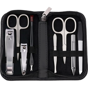 Ensemble de rasage et d'entretien des ongles de luxe 9 pièces en acier inoxydable 7 en 1, kit de soin pour homme avec logo personnalisé, portable et professionnel - Product Image 1