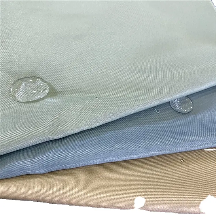 Morbido tessuto antibatterico in pelle di pesca in microfibra di poliestere impermeabile W/R per pantaloni estivi da spiaggia