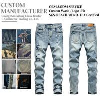 Jean slim homme coupe skinny délavé vintage effet vieilli avec éclaboussures de peinture et imprimé graffiti, style streetwear hip-hop