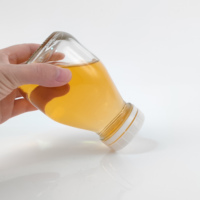 Bouteilles de boisson de jus de fruits de lait en verre vides de forme carrée courte de 10oz 16oz avec le chapeau inviolable blanc
