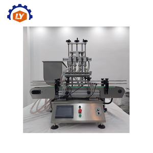 Máquina taponadora prensadora de llenado de botellas de plástico y vidrio líquido de escritorio completamente automática para aceite de bebidas - Product Image 2