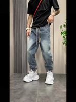 Jeans en denim déchiré à jambe large style rétro hip-hop OEM, taille mi-haute, imprimés en polyester pour hommes, vente en gros en vrac