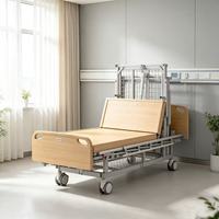 Nouvelle Arrivée Lit d'hôpital manuel basique à manivelle unique, avec pieds et dossier en bois massif, fonction de levage du dossier, roues verrouillables et portables