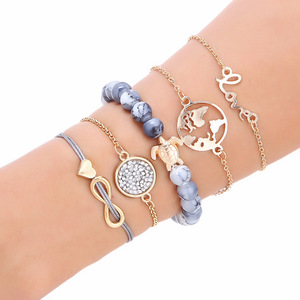 Ensemble de bracelets AliExpress Europe & Amérique 2022 : Bracelet tissé en forme de cœur, carte du monde, tortue, bracelet à perles (5 pièces) - Product Image 1