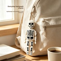 Nouveau produit haut de gamme : Porte-clés pendentif squelette d'Halloween en peluche, os blancs, pour une ambiance amusante, cadeau mignon pour enfants