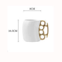 Nouveaux produits 2026 : Tasse à café créative en céramique de 400 ml avec poignée, motif Brass Knuckle Duster, personnalisable