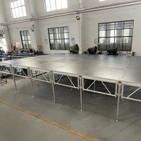 Scène modulaire en alliage d'aluminium noir durable de 18 mm, capacité de charge lourde de 1000 kg, installation rapide, surface antidérapante pour concert