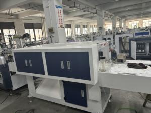 Macchina per la produzione di sacchetti per guanti multifunzione ad alta velocità per imballaggi efficienti - Product Image 3