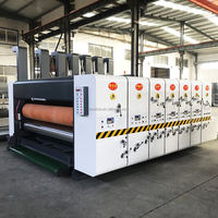 Machine de fabrication de boîtes en carton ondulé avec impression flexographique, découpe et rainurage électriques