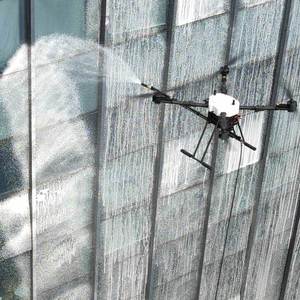 โดรนทำความสะอาด Jiusi D15R เป็นมิตรต่อสิ่งแวดล้อม ประหยัดน้ำ ให้ประสิทธิภาพสูง ปกป้องคนงานเพื่อความปลอดภัย โดรนทำความสะอาดที่มีประโยชน์ - Product Image 1