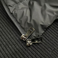 Veste matelassée à manches tricotées noire personnalisée pour hommes, manteau en duvet d'usine tricoté pour femmes