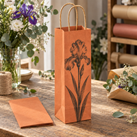 Sac cadeau pour vin en papier kraft avec poignées torsadées, imprimé Iris Bloom sur le devant, pour une bouteille - Orange