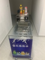 Meilleur prix 110V 220V Bingsu Machine rasée cône de neige électrique rasoir à glace fabricant rasé flocon de neige Machine à glace avec chariot pliable