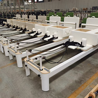 Reformer de Pilates Professionnel avec Cadre en Aluminium Anodisé Personnalisé 2026, Glissières à Ressort Robustes et Télescopiques pour Entraînement de Base Intensif