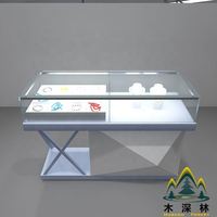 Vitrine à bijoux commerciale moderne, tiroirs multi-niveaux, construction en MDF et verre, éclairage LED, logo personnalisable, taille et couleur au choix