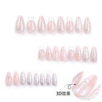 Expédition directe d'usine Nouveau style Faux ongles à presser faits main, forme amande, couleur unie étoile rouge, bord français court