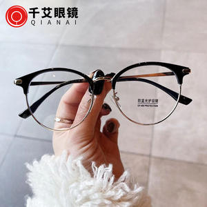 Gafas Qianai de Media Montura Ovalada con Lentes de PC Anti Luz Azul, Unisex, Protección Anti UV - Product Image 1