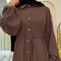 Vente en gros Robe islamique boutonnée à l'avant de couleur unie pour femmes Abaya musulmane pour femmes pour l'été et l'hiver de Dubaï Vêtements en gros