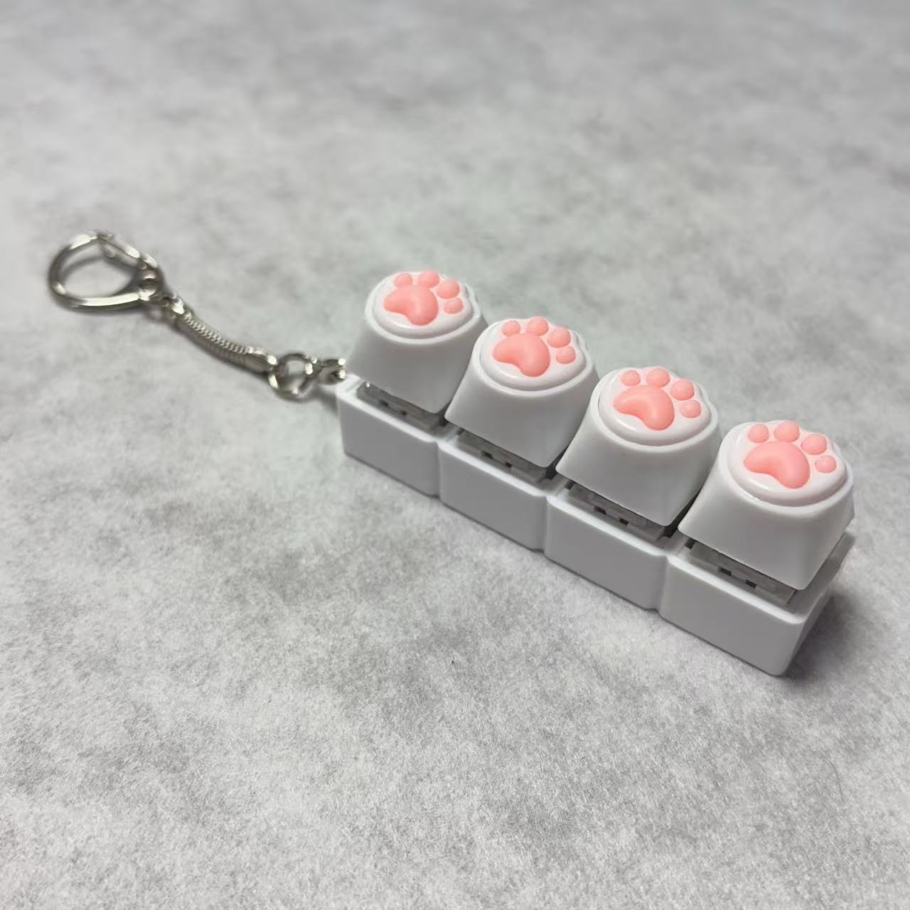 Coque blanche à quatre boutons - patte de chat blanche en silicone