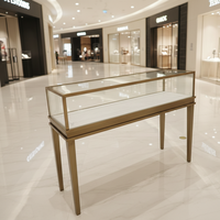 Promotion : Vitrine à bijoux en acier inoxydable avec éclairage LED, verre trempé, en stock, personnalisation du logo