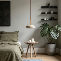 Lampe suspendue LED en travertin Wabi Sabi pour îlot de cuisine, salle à manger et décoration de restaurant, lampe suspendue de chevet en pierre de grotte jaune