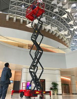 Plateforme de travail aérienne mobile hydraulique à ciseaux avec stabilisateurs pour la maintenance