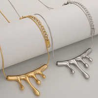 Collier pendentif serpent en acier inoxydable de haute qualité plaqué or 18 carats avec breloque irrégulière en lave volcanique tendance pour femme
