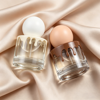 Flacons de parfum ronds vides personnalisés par le fabricant, luxueux et exquis, en verre transparent de 30 ml, avec vaporisateur.