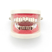 Qushine Grillz pour dents supérieures et inférieures, plaqué or véritable, style crocs de vampire, tendance Hip-Hop, pour femmes et hommes, cadeau