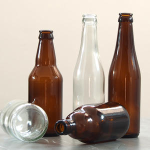 Fabricante 330ml Caja de bebidas Embalaje Botella de <span class=keywords><strong>cerveza</strong></span> de vidrio transparente con tapa de <span class=keywords><strong>corona</strong></span> de ámbar verde y sello de corcho Diseño de estampado en caliente - Product Image 6