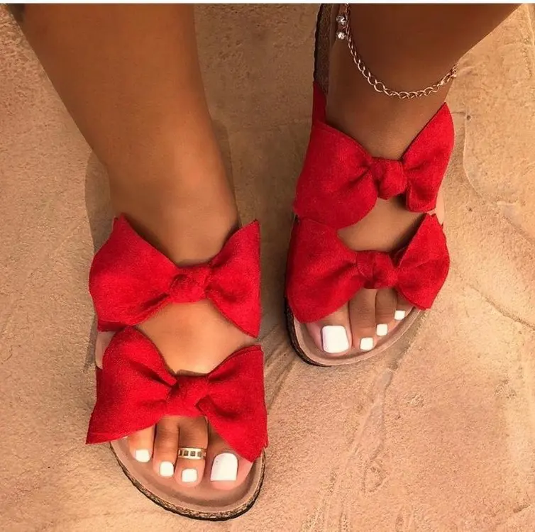 Europäische und amerikanische Mode-Stil Günstige Großhandel Schuhe 2022 China Sexy Bow knots Flache Sandalen Rutschen Summer Beach Hausschuhe