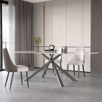 Table à manger extensible de luxe d'origine usine avec plateau en céramique transformable et pieds en métal
