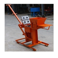 Vente directe d'usine QTC2-40 Machine à fabriquer des briques en argile manuelle Machine à fabriquer des blocs creux en terre compressée à emboîtement Prix