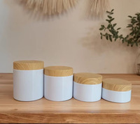 Pot à beurre corporel Crème de luxe en plastique pour animaux de compagnie 30g 50ml 100ml 200ml 250ml Pots cosmétiques en plastique blanc avec couvercle en bambou pour cosmétiques