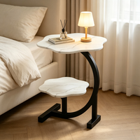 Table basse contemporaine en métal blanc crème avec plateau en métal, design sculpté à double couche creuse et support en boule solide Tenghang