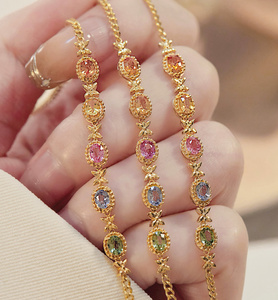 สร้อยข้อมือผีเสื้อประดับไพลินสีรุ้งทองคำแท้ 18K ยี่ห้อซินฟลาย |   สร้อยข้อมือประดับพลอยหลากสีธรรมชาติสำหรับผู้หญิง |   AU750 - Product Image 1