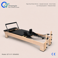 Machine de Pilates Reformer en bois d'érable avec barre à ressort réglable et barre de pied interne, équipement d'entraînement du tronc pour studio professionnel