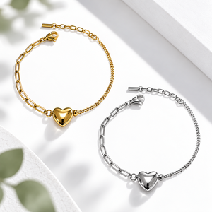 Pulsera de Corazón Asimétrico de Acero Inoxidable con Baño de Oro de 14K y Cadena de Eslabones Mixtos en Tono Dorado - Product Image 1